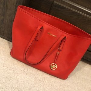 Orange Michael kors purse